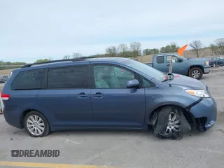 2014 Toyota Sienna Limited with VIN 5TDDK3DC5ES077601, listed as a IAAI auction lot 42163071 with 168,000 mi miles and . Bid and sale history available at DreamBid. Image 13.
