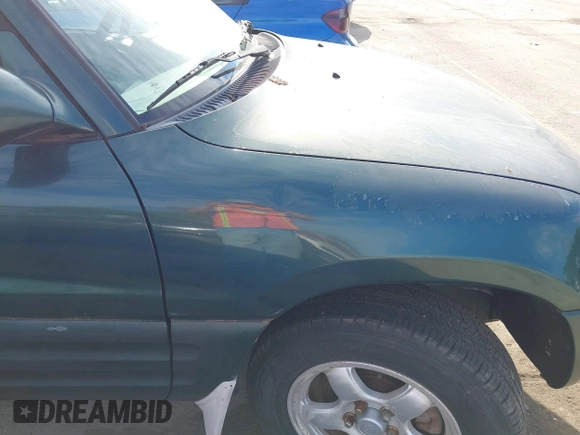 1999 Toyota RAV4 with VIN JT3HP10V3X7150917, listed as a IAAI auction lot 42206224 with 193,687 mi miles and . Bid and sale history available at DreamBid. Image 12.