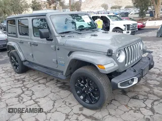 2021 Jeep Wrangler Unlimited Sahara with VIN 1C4JJXP64MW720263, listed as a IAAI auction lot 41514302 with 73,300 mi miles and . Bid and sale history available at DreamBid. Image 1.