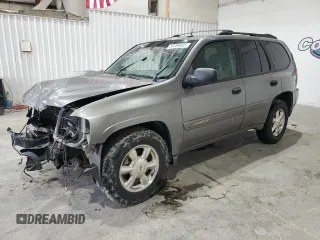 2005 GMC Envoy SLE z VIN 1GKDS13S752274178, wystawiony jako Copart lot #55289005 z przebiegiem 199 378 mil mil oraz Szkoda całkowita • Salvage title. Historia ofert i sprzedaży dostępna na DreamBid. Obrazek 1.