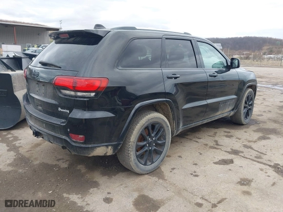2018 Jeep Grand Cherokee Laredo E with VIN 1C4RJFAG3JC324434, listed as a IAAI auction lot 41812311 with 140,820 mi miles. Bid and sale history available at carsss.com. Image 4.