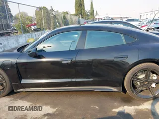 2022 Porsche Taycan z VIN WP0AA2Y10NSA11640, wystawiony jako IAAI lot #41215410 z przebiegiem 25 749 mil mil oraz . Historia ofert i sprzedaży dostępna na DreamBid. Obrazek 14.
