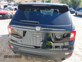 2019 Honda Passport EX-L with VIN 5FNYF7H58KB005624, listed as a IAAI auction lot 41344058 with 63,867 mi miles and . Bid and sale history available at carsss.com. Image 16.