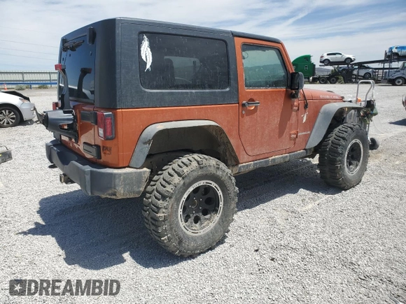 2010 Jeep Wrangler Rubicon with VIN 1J4BA6D12AL186887, listed as a Copart auction lot 57902545 with Not provided miles and Salvage title. Bid and sale history available at DreamBid. Image 3.