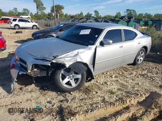2010 Dodge Charger SXT with VIN 2B3CA3CV7AH312057, listed as a IAAI auction lot 38385104 with 178,259 mi miles and . Bid and sale history available at carsss.com. Image 2.