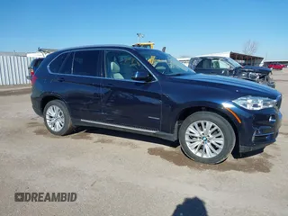 2016 BMW X5 sDrive35i with VIN 5UXKR2C55G0R71330, listed as a IAAI auction lot 41661140 with 128,457 mi miles. Bid and sale history available at carsss.com. Image 6.