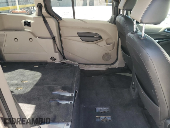 2015 Ford Transit Connect XLT with VIN NM0GS9F77F1185066, listed as a Copart auction lot 52049115 with 85,359 mi miles and Salvage title. Bid and sale history available at DreamBid. Image 11.