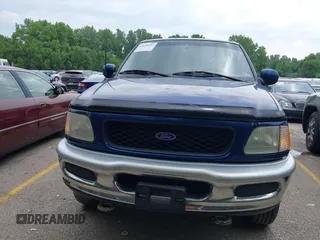 1997 Ford F-150 XL with VIN 1FTDX1866VKA77253, listed as a IAAI auction lot 42448287 with 122,540 mi miles and . Bid and sale history available at DreamBid. Image 6.