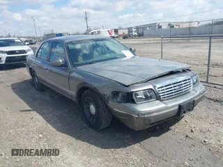 2001 Ford Crown Victoria LX z VIN 2FAFP74W01X102534, wystawiony jako IAAI lot #42017605 z przebiegiem 160 063 mil mil oraz . Historia ofert i sprzedaży dostępna na DreamBid. Obrazek 1.