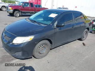 2009 Toyota Corolla with VIN JTDBL40E899046607, listed as a IAAI auction lot 42141452 with 204,769 mi miles. Bid and sale history available at carsss.com. Image 2.