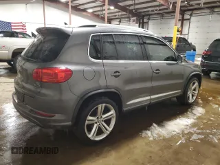 2016 Volkswagen Tiguan R-Line with VIN WVGBV7AX4GW085961, listed as a Copart auction lot 41828715 with 102,369 mi miles and Salvage Title. Bid and sale history available at DreamBid. Image 3.