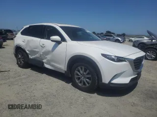 2019 Mazda CX-9 Touring with VIN JM3TCBCY3K0312986, listed as a Copart auction lot 58742195 with 119,464 mi miles and Salvage title. Bid and sale history available at DreamBid. Image 4.