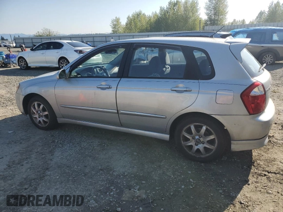 2005 Kia Spectra with VIN KNAFE161355121968, listed as a Copart auction lot 54621465 with 221,951 mi miles and Clean Title. Bid and sale history available at carsss.com. Image 2.