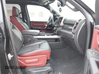 2019 Ram 1500 Rebel z VIN 1C6SRFLT6KN599362, wystawiony jako IAAI lot #41560018 z przebiegiem Nie podano mil oraz . Historia ofert i sprzedaży dostępna na DreamBid. Obrazek 5.
