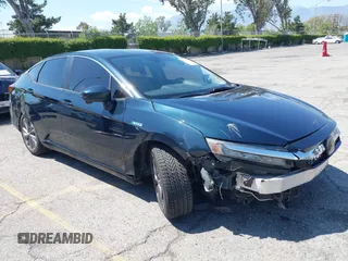 2018 Honda Clarity Plug-In Hybrid Touring with VIN JHMZC5F39JC022655, listed as a IAAI auction lot 42149002 with 118,913 mi miles. Bid and sale history available at carsss.com. Image 1.