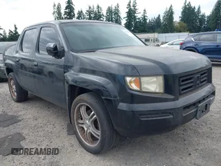2006 Honda Ridgeline RTL with VIN 2HJYK16526H517466, listed as a IAAI auction lot 42737202 with 184,856 mi miles and . Bid and sale history available at DreamBid. Image 1.