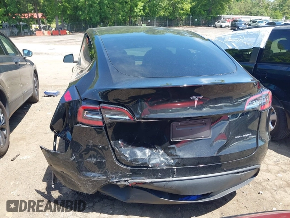 2022 Tesla Model Y Long Range z VIN 7SAYGDEE4NA006645, wystawiony jako IAAI lot #42192495 z przebiegiem 28 784 mil mil oraz . Historia ofert i sprzedaży dostępna na DreamBid. Obrazek 6.