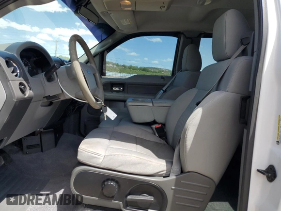 2007 Ford F-150 XLT with VIN 1FTPX14V87FA88759, listed as a Copart auction lot 57173705 with 180,308 mi miles and Salvage title. Bid and sale history available at DreamBid. Image 7.