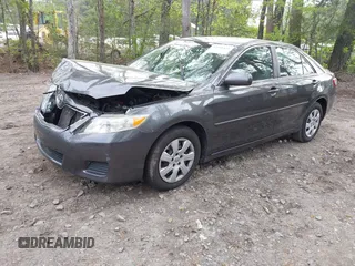 2011 Toyota Camry LE with VIN 4T4BF3EK4BR153724, listed as a IAAI auction lot 42031472 with 122,907 mi miles and . Bid and sale history available at carsss.com. Image 2.