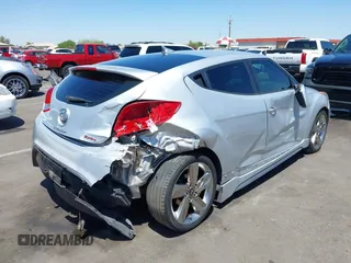 2013 Hyundai Veloster Turbo z VIN KMHTC6AE0DU177983, wystawiony jako IAAI lot #42292102 z przebiegiem 121 142 mil mil oraz . Historia ofert i sprzedaży dostępna na DreamBid. Obrazek 6.