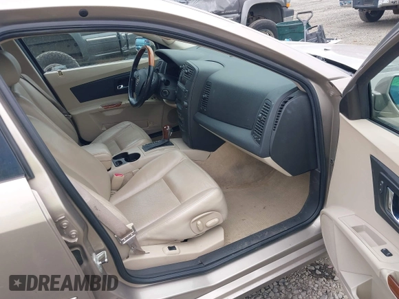 2004 Cadillac CTS with VIN 1G6DM577140109016, listed as a IAAI auction lot 42110056 with 175,476 mi miles. Bid and sale history available at carsss.com. Image 5.