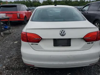 2013 Volkswagen Jetta SE with VIN 3VWDP7AJ8DM277587, listed as a Copart auction lot 58093815 with 136,608 mi miles and Salvage title. Bid and sale history available at DreamBid. Image 6.