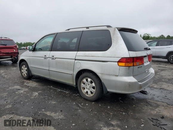 2003 Honda Odyssey EX z VIN 5FNRL18603B008148, wystawiony jako Copart lot #60669825 z przebiegiem 128 115 mil mil oraz Czysty tytuł • Clean title. Historia ofert i sprzedaży dostępna na DreamBid. Obrazek 2.