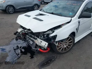 2011 Mitsubishi Lancer Evolution GSR with VIN JA32W8FV9BU045781, listed as a IAAI auction lot 41308314 with 102,840 mi miles. Bid and sale history available at carsss.com. Image 6.