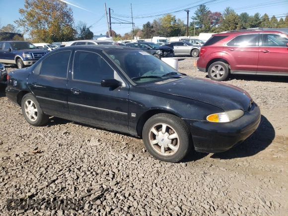 1996 Ford Contour z VIN 1FALP65L5TK212857, wystawiony jako Copart lot #76701614 z przebiegiem 74 994 mil mil oraz Szkody całkowita. Historia ofert i sprzedaży dostępna na DreamBid. Obrazek 4.