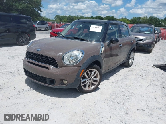 2013 MINI Countryman S с VIN WMWZC3C59DWP24907, выставлен на аукционе IAAI как лот 42719063 с пробегом 64 138 миль миль и . История ставок и продаж доступна на DreamBid. Изображение 2.