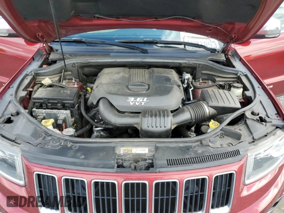 2014 Jeep Grand Cherokee Limited z VIN 1C4RJFBGXEC101022, wystawiony jako Copart lot #57526125 z przebiegiem 124 463 mil mil oraz Szkoda całkowita • Salvage title. Historia ofert i sprzedaży dostępna na DreamBid. Obrazek 12.