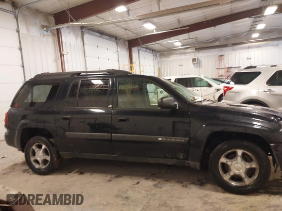 2004 Chevrolet TrailBlazer EXT LT with VIN 1GNET16SX46215438, listed as a IAAI auction lot 41481236 with 240,215 mi miles. Bid and sale history available at carsss.com. Image 13.