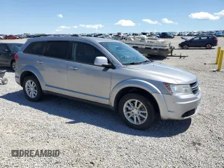 2017 Dodge Journey SXT with VIN 3C4PDDBG3HT591993, listed as a Copart auction lot 58241065 with 161,964 mi miles and Salvage title. Bid and sale history available at DreamBid. Image 4.