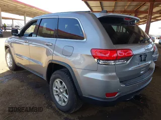 2018 Jeep Grand Cherokee Laredo E with VIN 1C4RJEAG3JC399869, listed as a IAAI auction lot 42305627 with 64,004 mi miles and . Bid and sale history available at DreamBid. Image 3.