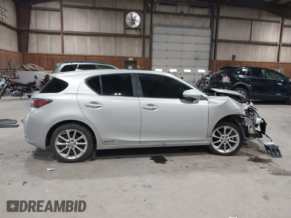 2012 Lexus CT 200h z VIN JTHKD5BH0C2112169, wystawiony jako IAAI lot #42091355 z przebiegiem 260 644 mil mil oraz . Historia ofert i sprzedaży dostępna na DreamBid. Obrazek 13.