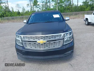 2015 Chevrolet Tahoe LT with VIN 1GNSCBKC1FR615817, listed as a IAAI auction lot 41760474 with 242,148 mi miles and . Bid and sale history available at DreamBid. Image 12.