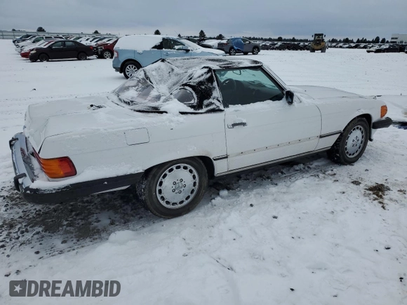 1986 Mercedes-Benz 560 SL z VIN WDBBA48D8GA042178, wystawiony jako Copart lot #41809525 z przebiegiem 80 788 mil mil oraz Szkody całkowita. Historia ofert i sprzedaży dostępna na DreamBid. Obrazek 3.