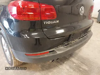 2014 Volkswagen Tiguan SE z VIN WVGAV3AX9EW614094, wystawiony jako IAAI lot #42350601 z przebiegiem 128 996 mil mil oraz . Historia ofert i sprzedaży dostępna na DreamBid. Obrazek 12.