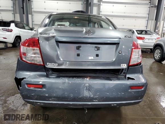 2009 Suzuki SX4 Man FWD with VIN JS2YC412496200218, listed as a Copart auction lot 46938825 with 63,909 mi miles and Salvage Title. Bid and sale history available at carsss.com. Image 6.