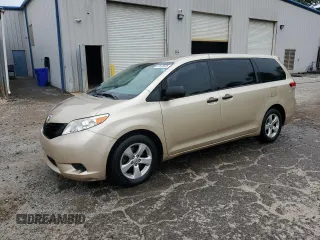 2014 Toyota Sienna L with VIN 5TDZK3DC3ES499663, listed as a Copart auction lot 57615535 with 201,561 mi miles and Salvage title. Bid and sale history available at DreamBid. Image 1.