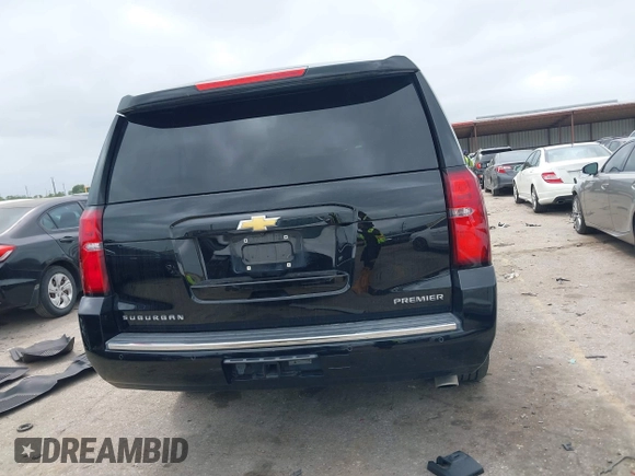 2019 Chevrolet Suburban Premier with VIN 1GNSKJKJ3KR231852, listed as a IAAI auction lot 41957728 with 136,263 mi miles and . Bid and sale history available at DreamBid. Image 16.