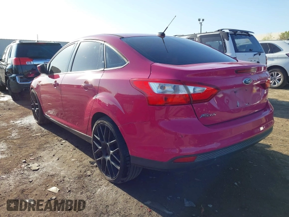 2012 Ford Focus SE with VIN 1FAHP3F2XCL211644, listed as a IAAI auction lot 41977107 with 142,271 mi miles and . Bid and sale history available at DreamBid. Image 3.
