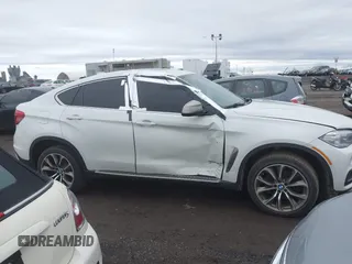2015 BMW X6 xDrive35i with VIN 5UXKU2C57F0N77194, listed as a IAAI auction lot 41818860 with 105,579 mi miles and . Bid and sale history available at DreamBid. Image 13.