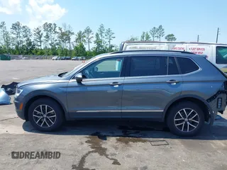 2021 Volkswagen Tiguan SE z VIN 3VV3B7AX7MM113248, wystawiony jako IAAI lot #42025906 z przebiegiem 92 442 mil mil oraz . Historia ofert i sprzedaży dostępna na DreamBid. Obrazek 14.