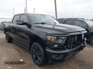 2020 Ram 1500 Big Horn with VIN 1C6SRFFT0LN216433, listed as a IAAI auction lot 40032077 with 102,298 mi miles. Bid and sale history available at carsss.com. Image 1.