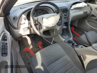 1999 Ford Mustang GT с VIN 1FAFP45X8XF133623, выставлен на аукционе Copart как лот 56319745 с пробегом 221 040 миль миль и Списание • Salvage title. История ставок и продаж доступна на DreamBid. Изображение 8.
