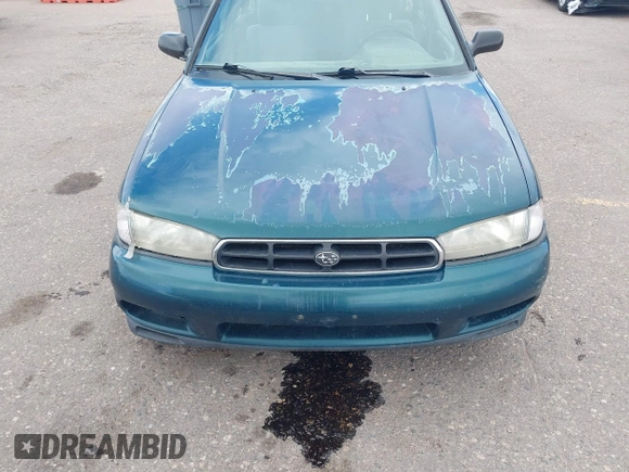 1999 Subaru Legacy L z VIN 4S3BK4355X6305664, wystawiony jako IAAI lot #42077758 z przebiegiem 70 585 mil mil oraz . Historia ofert i sprzedaży dostępna na DreamBid. Obrazek 6.