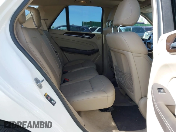 2014 Mercedes-Benz M 350 with VIN 4JGDA5HB7EA293278, listed as a IAAI auction lot 42151641 with 93,764 mi miles and . Bid and sale history available at DreamBid. Image 8.