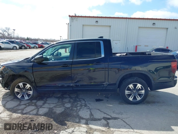 2019 Honda Ridgeline RTL z VIN 5FPYK3F50KB000027, wystawiony jako IAAI lot #41856522 z przebiegiem 98 590 mil mil oraz . Historia ofert i sprzedaży dostępna na DreamBid. Obrazek 15.
