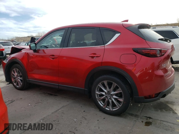 2021 Mazda CX-5 Grand Touring Reserve with VIN JM3KFBAY4M0358478, listed as a Copart auction lot 50839815 with 84,932 mi miles and Salvage Title. Bid and sale history available at DreamBid. Image 2.